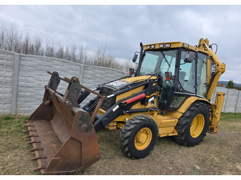 Багер-товарач CATERPILLAR