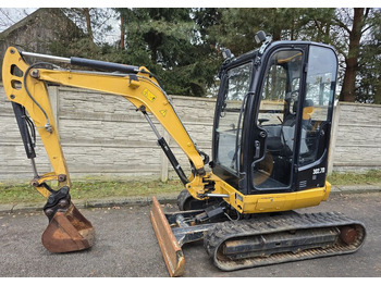 Мини багер CATERPILLAR