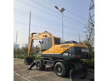 Колесен багер HYUNDAI R210