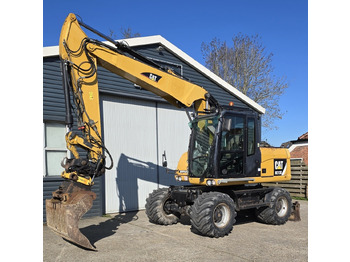 Колесен багер CATERPILLAR M313D: снимка 2