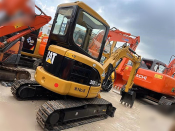 Мини багер CATERPILLAR 303