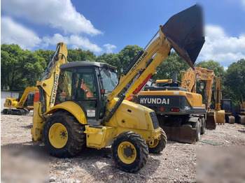 Багер-товарач NEW HOLLAND B95B: снимка 4