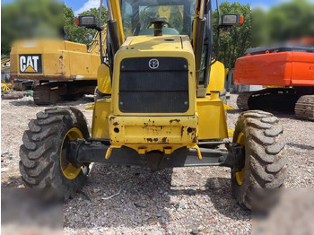Багер-товарач NEW HOLLAND B95B: снимка 2