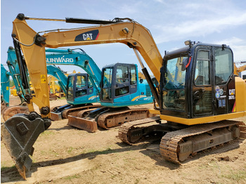 Багер CATERPILLAR 307E