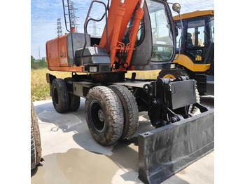 Багер HITACHI ZX130W