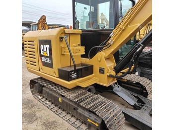 Мини багер CATERPILLAR
