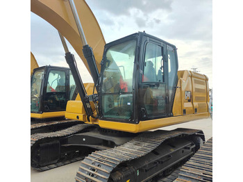 Багер CATERPILLAR