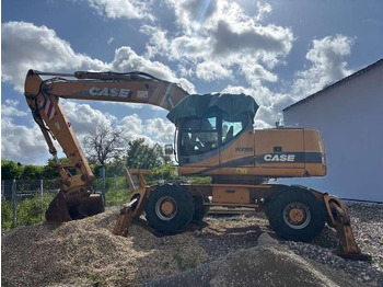 Колесен багер CASE