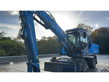 Багер за манипулиране на материали FUCHS