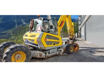 Крачещ багер MENZI MUCK