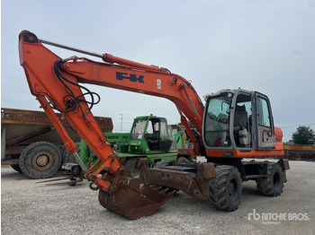 Колесен багер KOBELCO