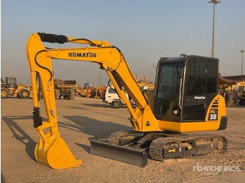 Мини багер KOMATSU