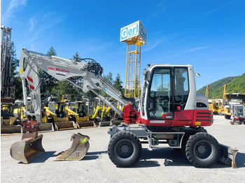 Мини багер TAKEUCHI