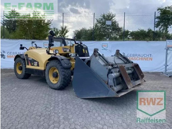 Мини багер CATERPILLAR