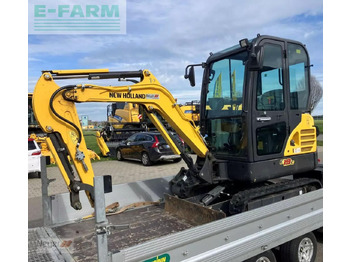 Мини багер NEW HOLLAND