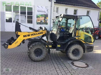 Мини багер NEW HOLLAND