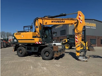 Колесен багер Hyundai HW 210: снимка 5