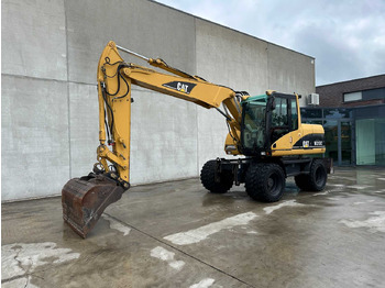 Колесен багер CATERPILLAR M313C