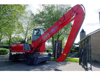 Багер за манипулиране на материали NEW HOLLAND