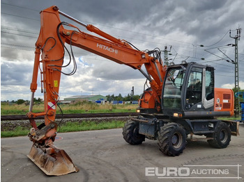 Колесен багер HITACHI ZX140W-3