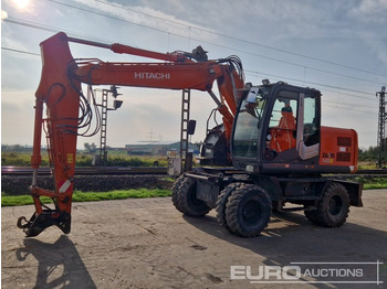 Колесен багер HITACHI ZX140W-3