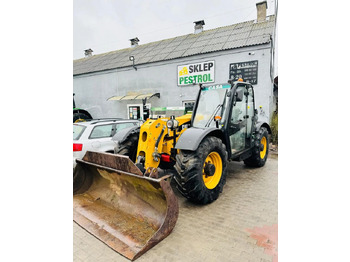 Телескопичен товарач CATERPILLAR TH