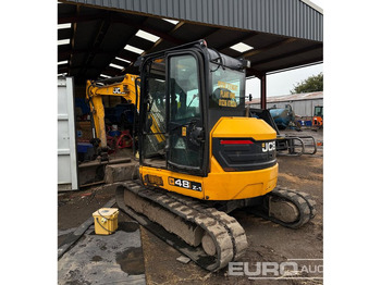 Мини багер JCB