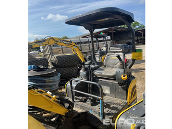 Мини багер NEW HOLLAND