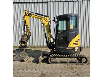 Мини багер NEW HOLLAND