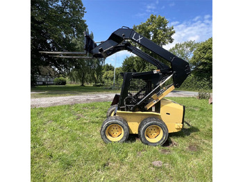 Мини челен товарач New Holland LX465: снимка 4