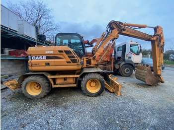 Колесен багер CASE