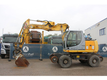 Колесен багер NEW HOLLAND