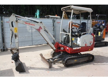 Мини багер TAKEUCHI