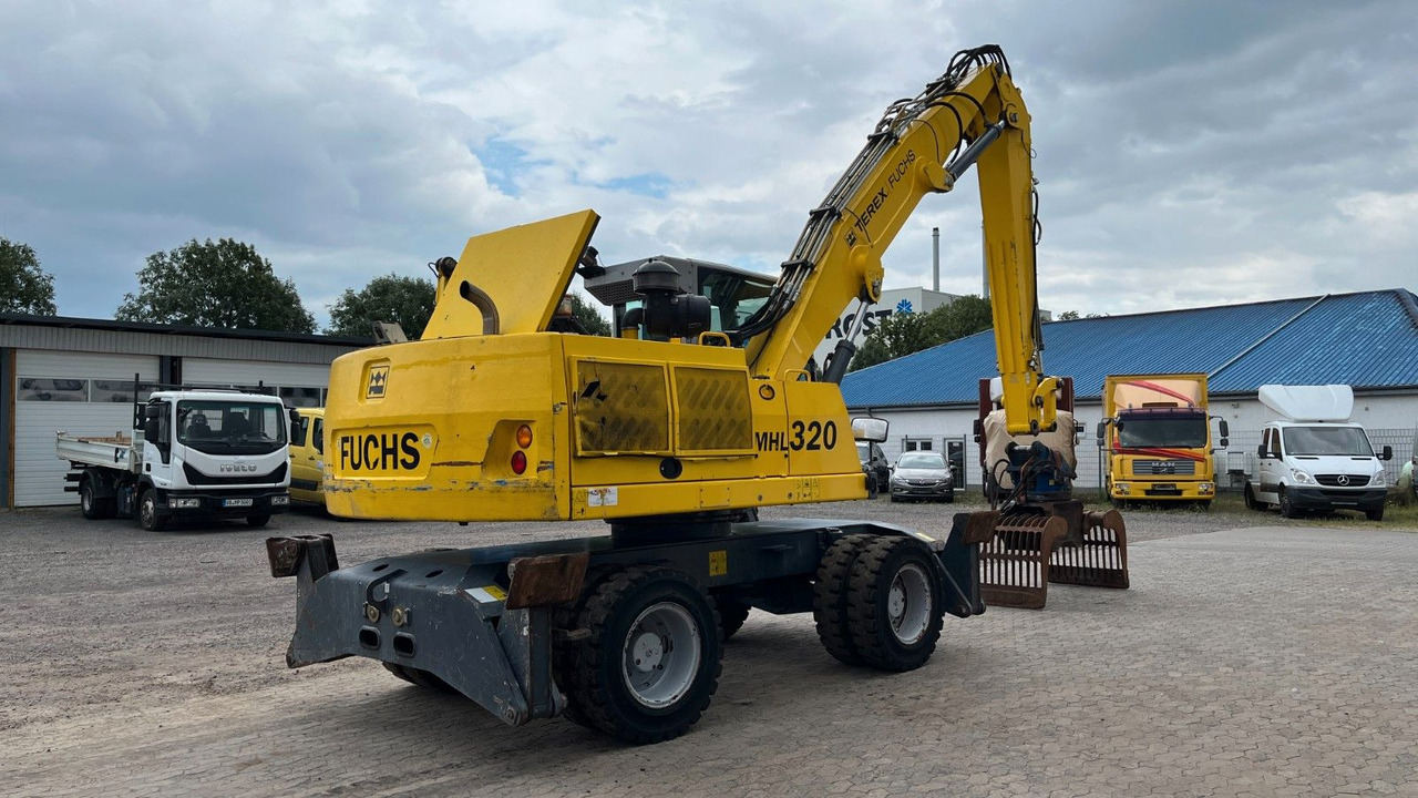 Fuchs TeRex MHL 320 D Umschlagbagger Greifer Pratzen - Багер за манипулиране на материали: снимка 5 Fuchs TeRex MHL 320 D Umschlagbagger Greifer Pratzen - Багер за манипулиране на материали: снимка 5