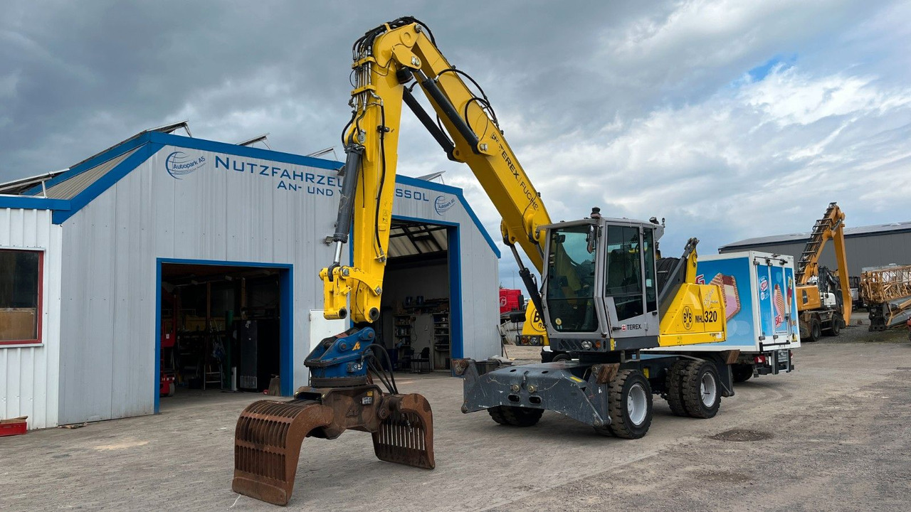 Fuchs TeRex MHL 320 D Umschlagbagger Greifer Pratzen - Багер за манипулиране на материали: снимка 3 Fuchs TeRex MHL 320 D Umschlagbagger Greifer Pratzen - Багер за манипулиране на материали: снимка 3