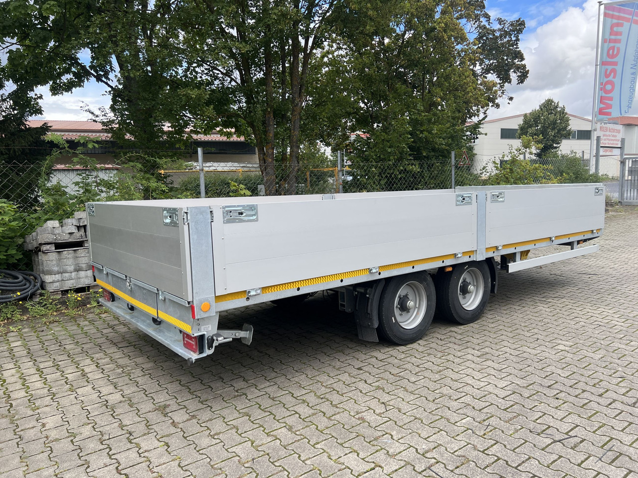 Möslein THT 11 G 6,2 L Tandem- Pritschenanhänger- Tieflader - Бордово ремарке/ Платформа: снимка 4 Möslein THT 11 G 6,2 L Tandem- Pritschenanhänger- Tieflader - Бордово ремарке/ Платформа: снимка 4