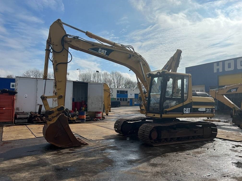 CAT 317 - Верижен багер: снимка 1 CAT 317 - Верижен багер: снимка 1