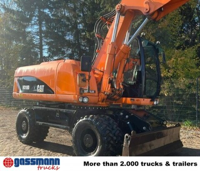 CAT M318D Mobilbagger - Строителна техника: снимка 5 CAT M318D Mobilbagger - Строителна техника: снимка 5