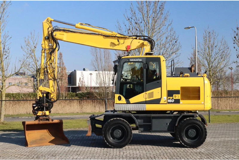 Komatsu PW160-11 | ENGCON TILTROTATOR | BUCKET | TRAILER HYDR. - Колесен багер: снимка 1 Komatsu PW160-11 | ENGCON TILTROTATOR | BUCKET | TRAILER HYDR. - Колесен багер: снимка 1