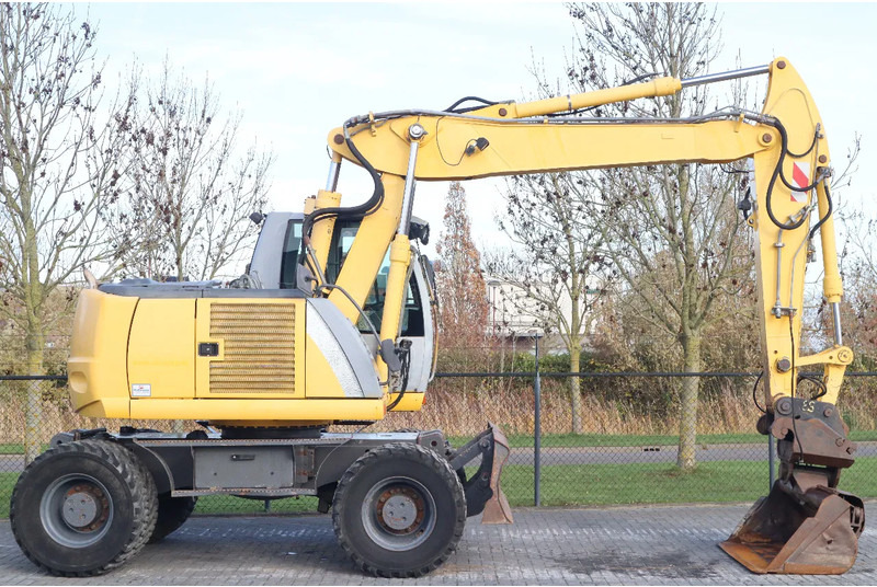 New Holland MH CITY | TILT BUCKET | QUICK COUPLER | DOZER BLADE - Колесен багер: снимка 4 New Holland MH CITY | TILT BUCKET | QUICK COUPLER | DOZER BLADE - Колесен багер: снимка 4