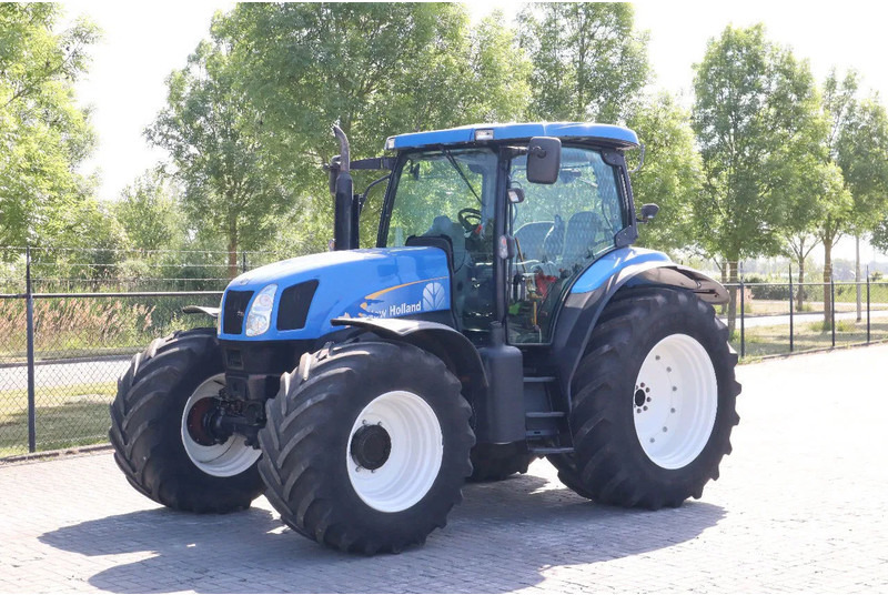 New Holland TS135A | 40 KM/H | 4X4 | SUPERSTEER - Трактор: снимка 1 New Holland TS135A | 40 KM/H | 4X4 | SUPERSTEER - Трактор: снимка 1