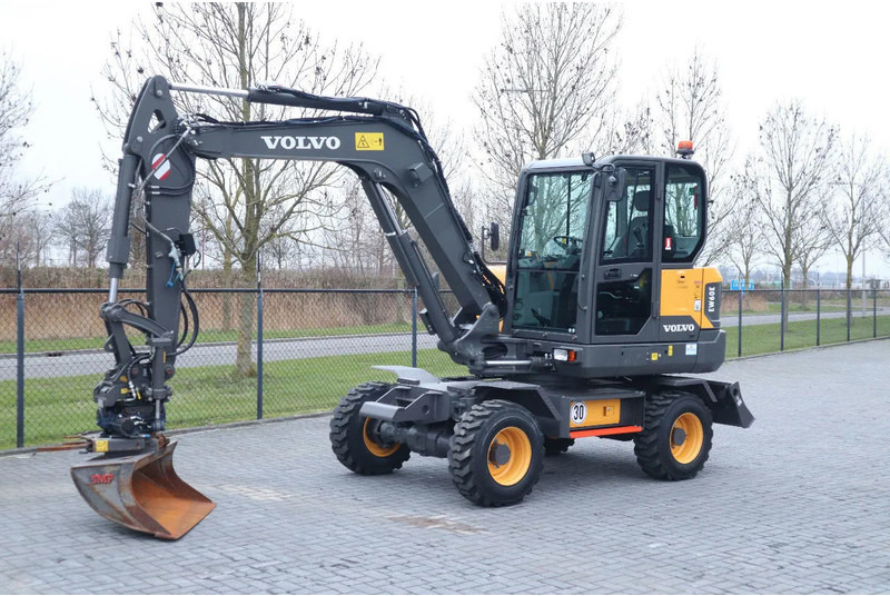 Volvo EW60E | DEMO | 30 KM/H | ROTOTILT + GRIPPER | BUCKET - Колесен багер: снимка 2 Volvo EW60E | DEMO | 30 KM/H | ROTOTILT + GRIPPER | BUCKET - Колесен багер: снимка 2