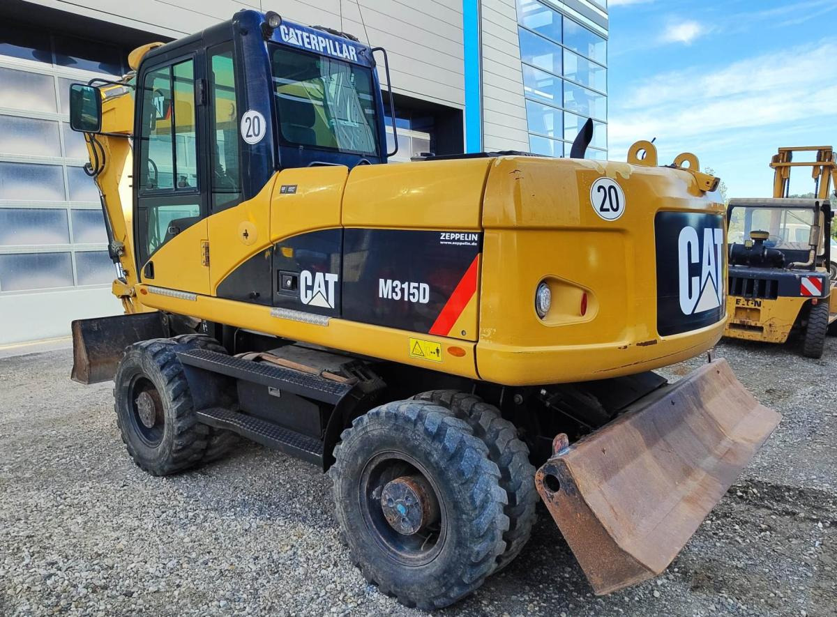 Caterpillar M315D - Колесен багер: снимка 1 Caterpillar M315D - Колесен багер: снимка 1
