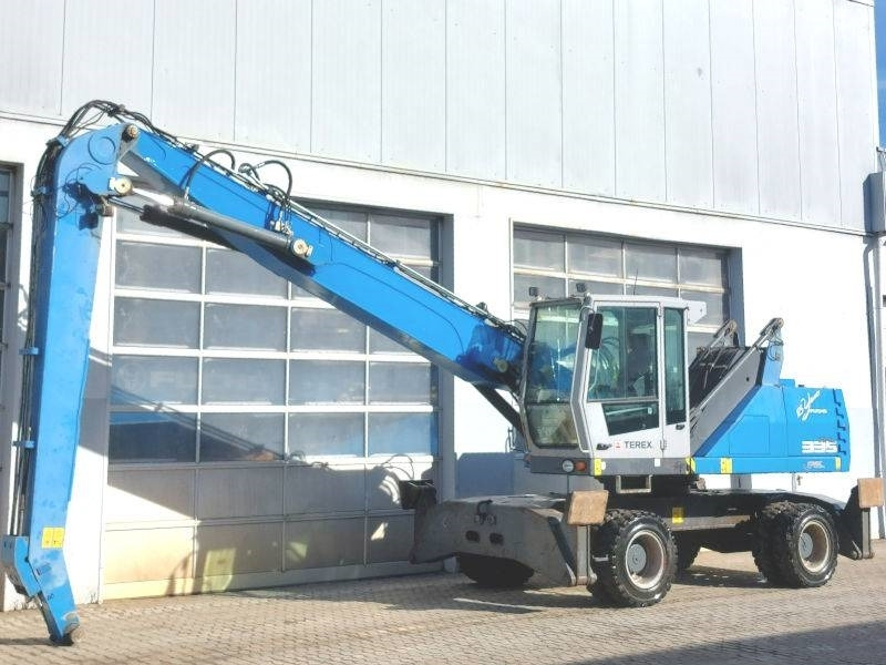 Fuchs MHL 335 E - Багер за манипулиране на материали: снимка 2 Fuchs MHL 335 E - Багер за манипулиране на материали: снимка 2