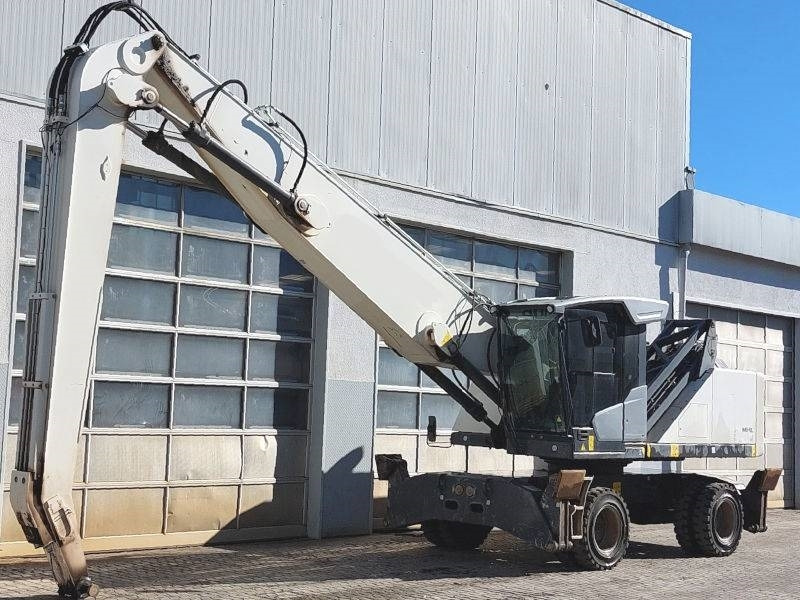 Fuchs MHL 340 F - Багер за манипулиране на материали: снимка 2 Fuchs MHL 340 F - Багер за манипулиране на материали: снимка 2