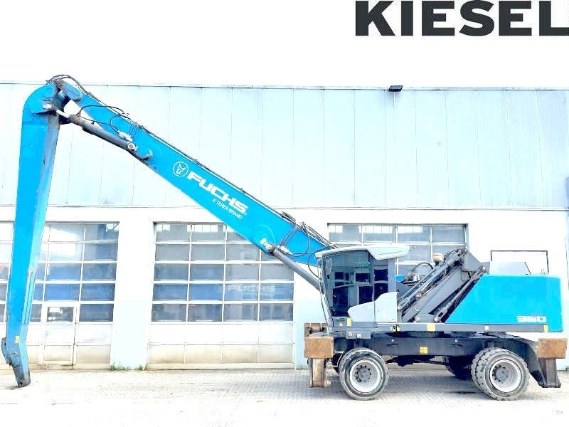 Fuchs MHL 360 F - Багер за манипулиране на материали: снимка 1 Fuchs MHL 360 F - Багер за манипулиране на материали: снимка 1
