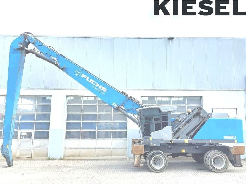 Fuchs MHL 360 F - Багер за манипулиране на материали: снимка 1 Fuchs MHL 360 F - Багер за манипулиране на материали: снимка 1