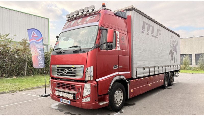 Volvo FH13 540 - Камион с брезент: снимка 1 Volvo FH13 540 - Камион с брезент: снимка 1