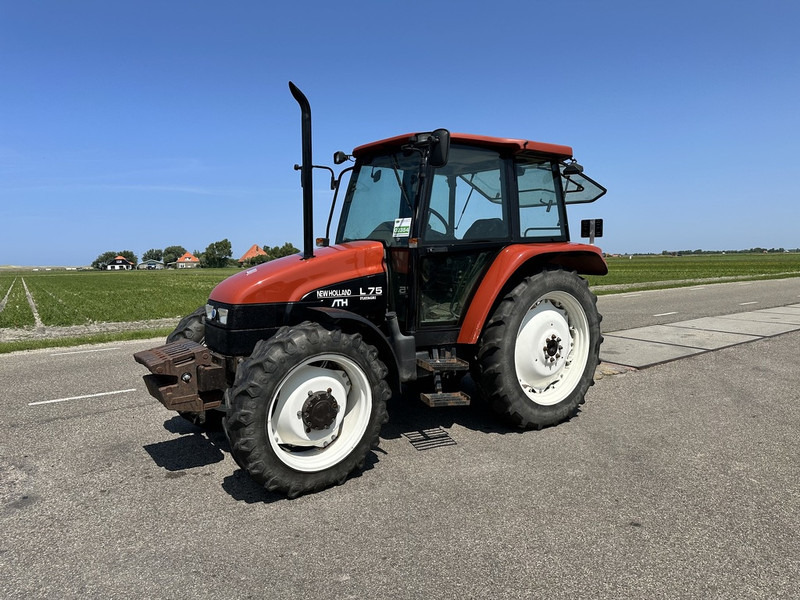 New Holland L 75 - Трактор: снимка 1 New Holland L 75 - Трактор: снимка 1