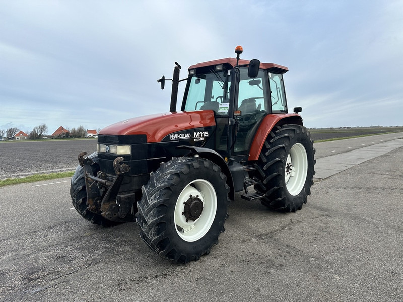 Трактор New Holland M115: снимка 1